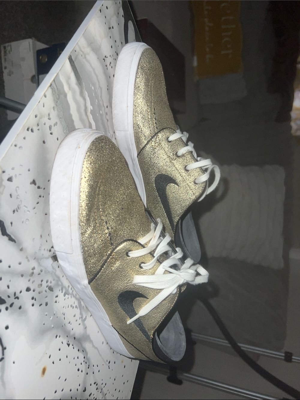 Nike Metallic Gold Low-Top Sneakers with Black Swoosh